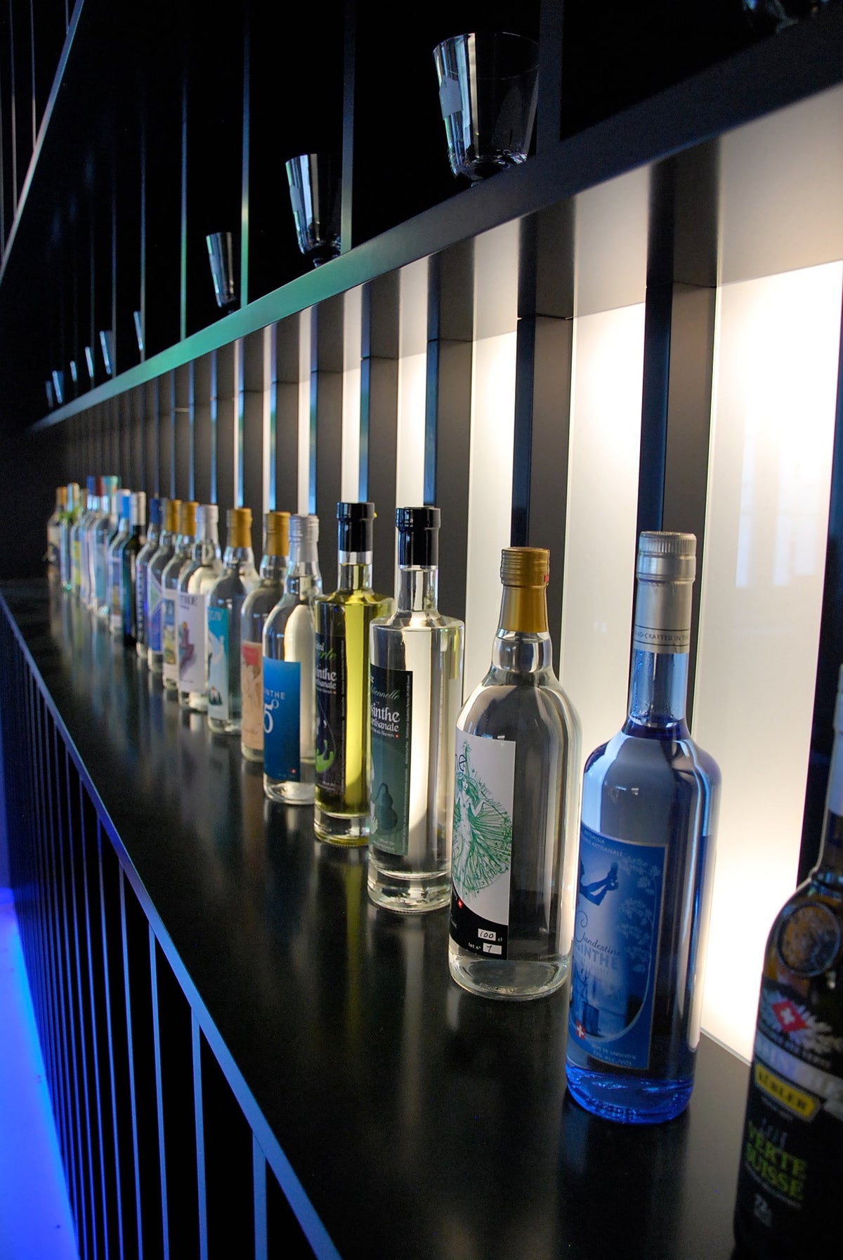 A bar display of absinthe bottles during the 2022 edition of Absinthe en Fête