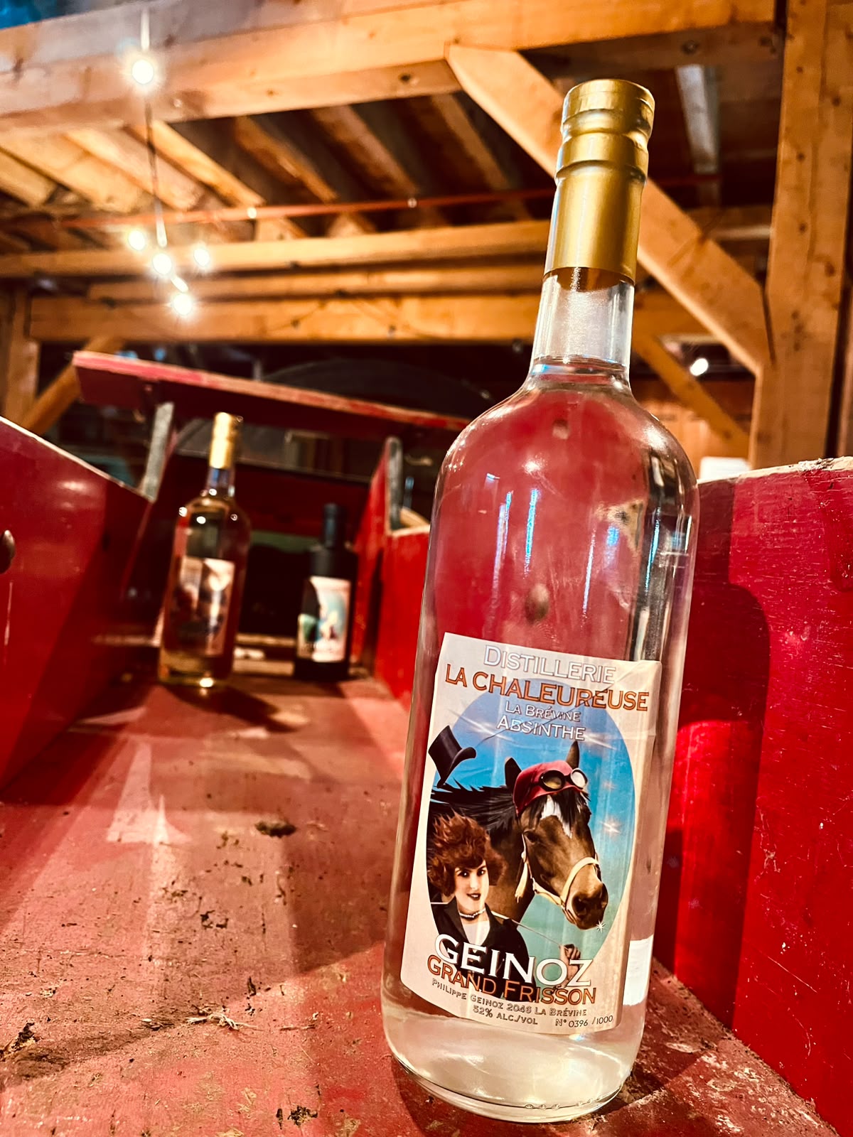 A bottle of Grand Frisson in the drying house