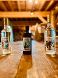 Three Geinoz absinthes on a table in the Boveresse drying house